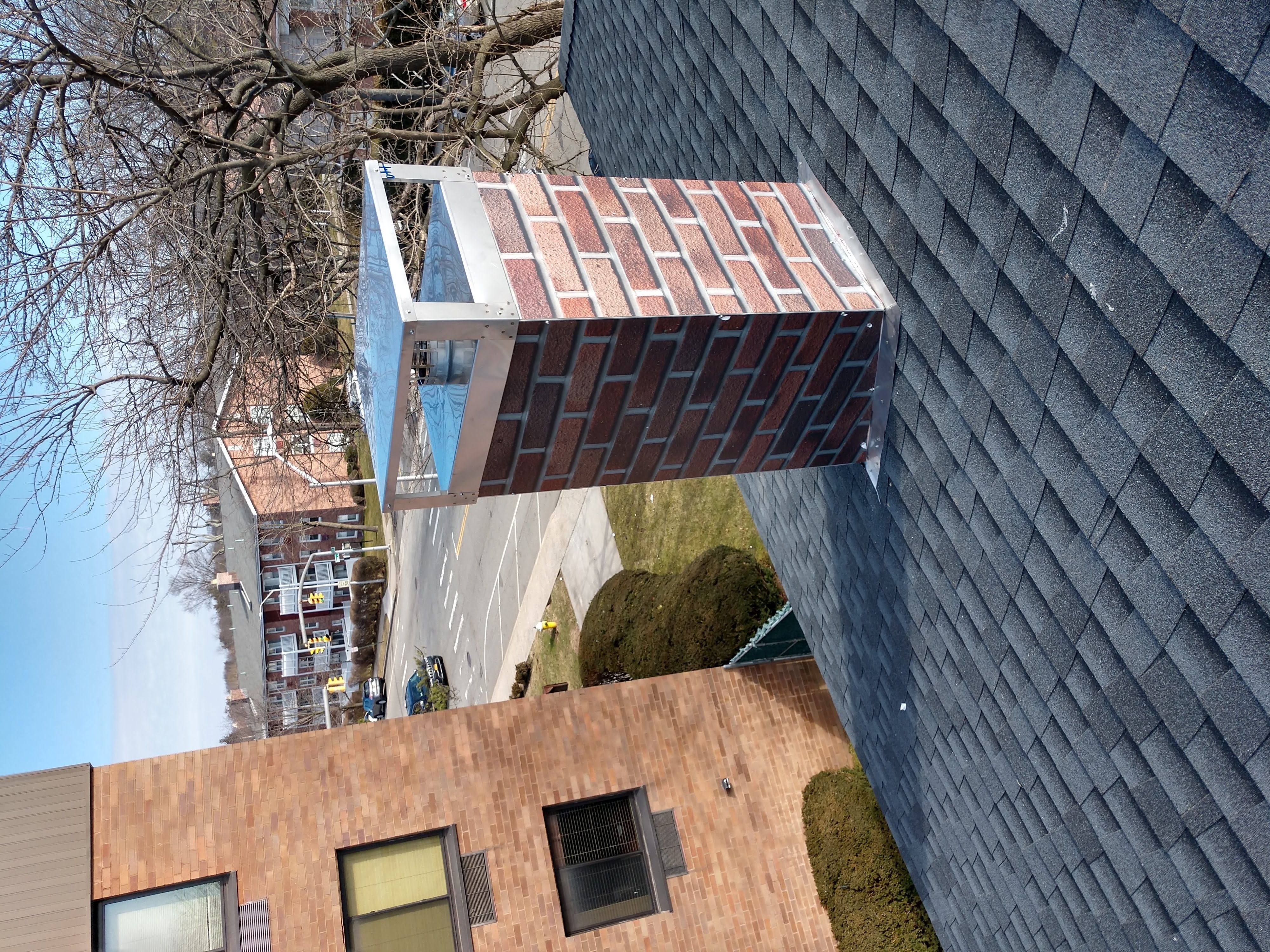New elastomeric sealant applied to chimney crown in Babylon, NY